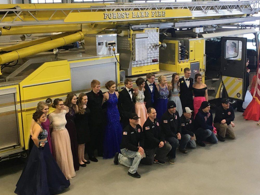 ottawasuncom's tweet photo. #BlizzardProm: Minnesota firefighters open station for prom pics during blizzard https://t.co/8TXiZqG7eA https://t.co/fGk15V8eCu