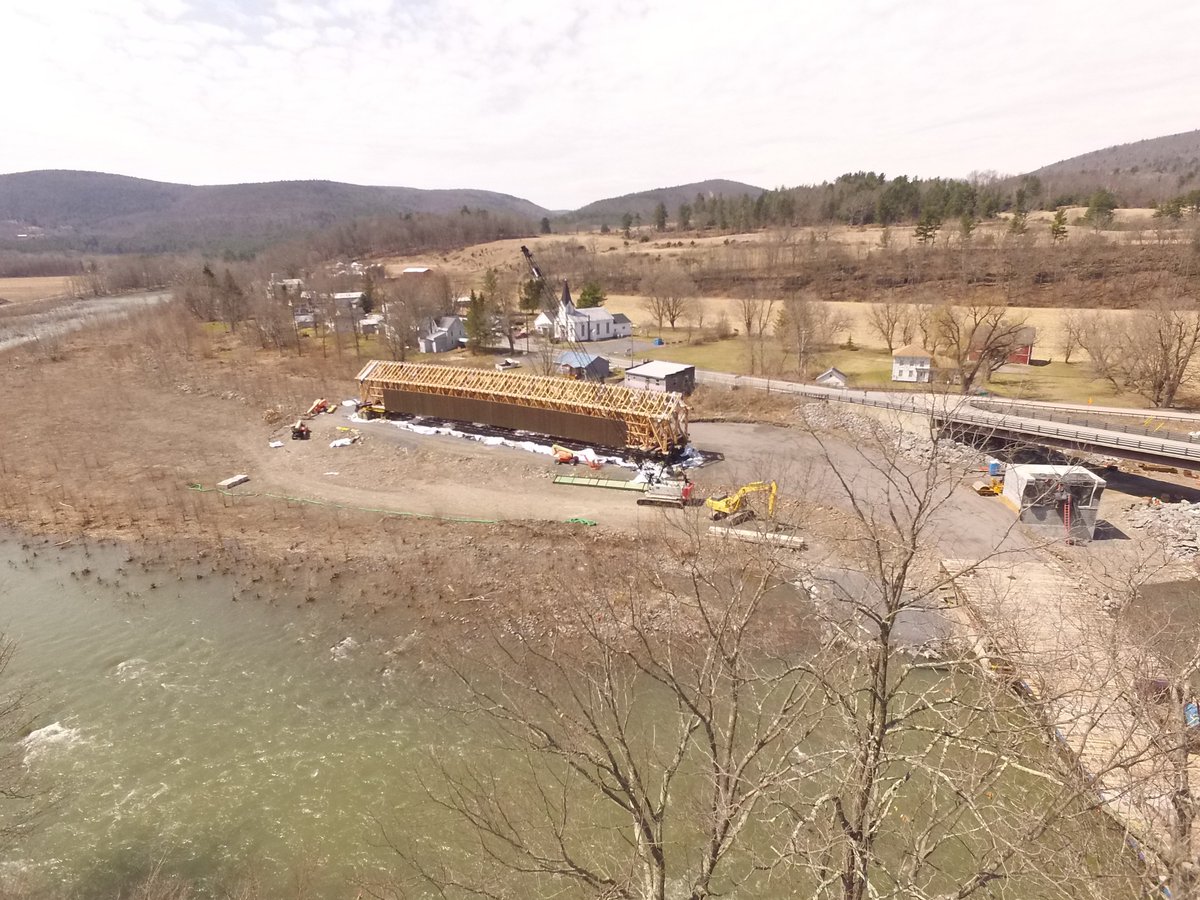 rickdemeis's tweet photo. The scene last Friday in North Blenheim, New York. The reconstructed  Blenheim Covered Bridge, the longest single span one in the US at 210 ft  pier-to-pier, will soon be moved to a temporary span then hoisted on to  its new, higher supports! https://t.co/kr5o1LKZl8