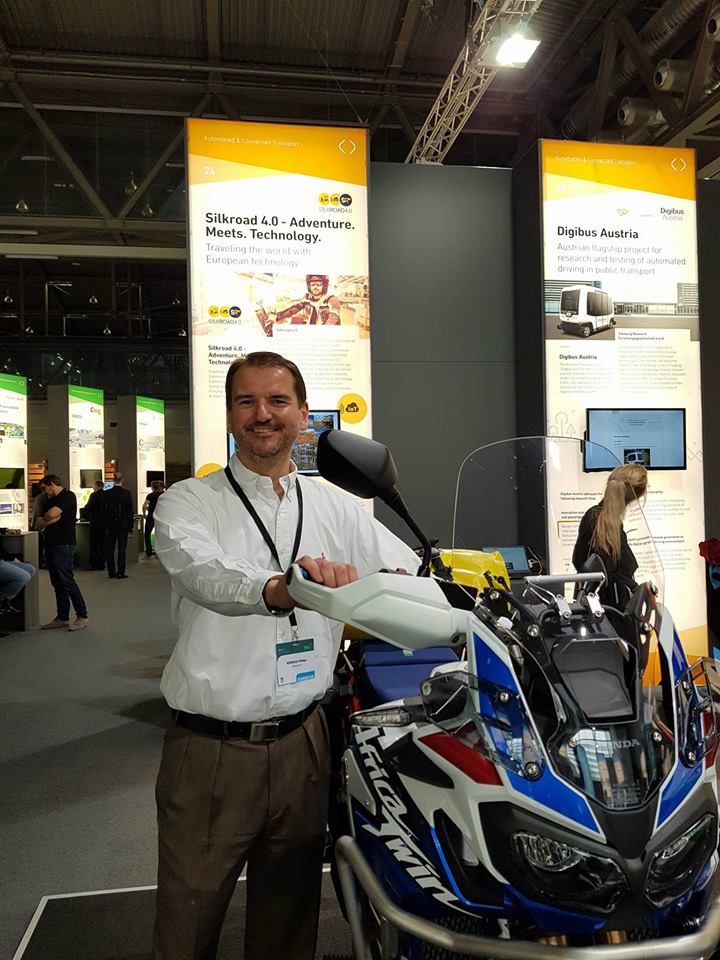 Silkroad_40's tweet photo. Some impressions of @PhilipeReinisch and his @HondaMotorcycls #africatwin in the interactive zone of the @TRA_Conference today. We are looking forward to the #pressconference tomorrow morning. Stay tuned for more updates ... #TRA2018 #silkroad40 #Vienna #TransportResearchArena https://t.co/p0EVkvEFyZ