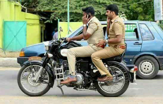 brreddy67's tweet photo. @HYDTP Can police violate rules driving without helmet and also talking over phone https://t.co/9YLdpnSwBk