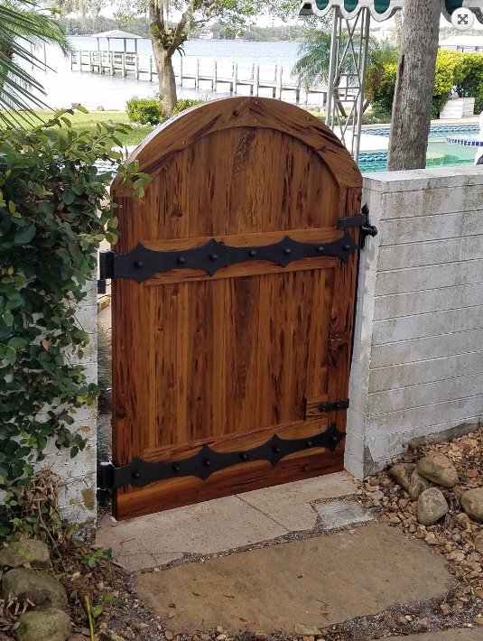 A pecky cypress gate can add a touch of charm to your yard | @FloridaCypress bit.ly/2HwP48E