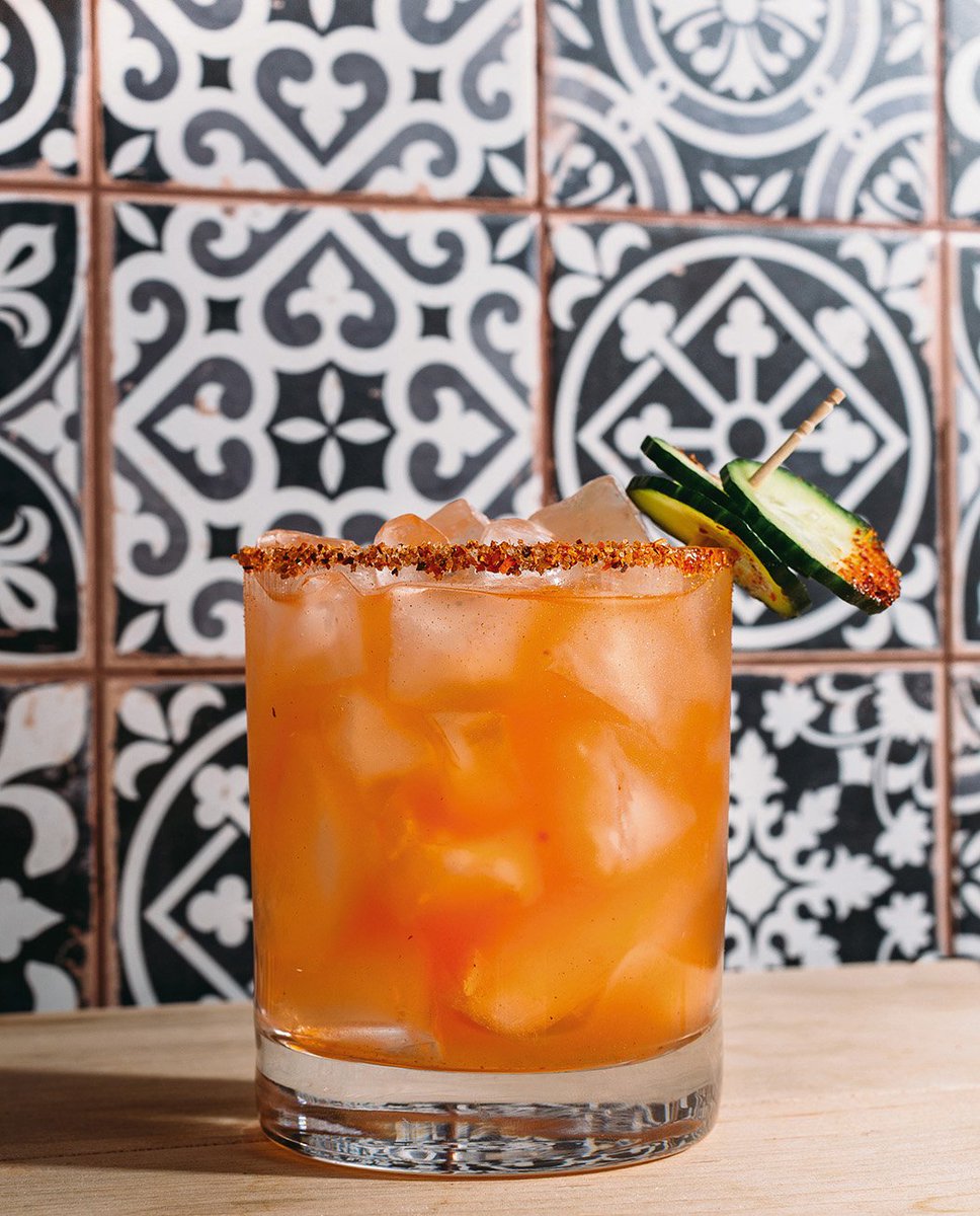 imbibe's tweet photo. From @paulaforbes #TheAustinCookbook comes this cocktail from @contigoaustin made with gin, Aperol, cucumber and lime. https://t.co/J7uHqjoum5 https://t.co/UF3rrfB7AE
