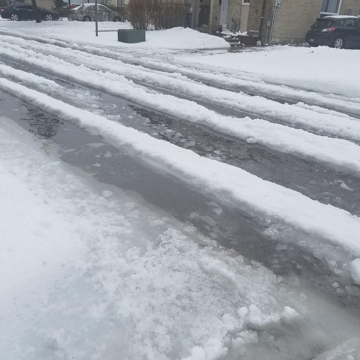 The flood after the #onstorm on my street in #Brampton. Good job cleaning up <a href="/CityBrampton/">City of Brampton</a> #cp24icestorm