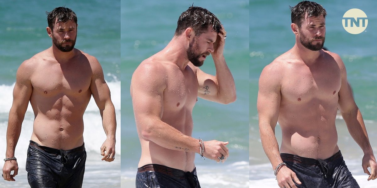 TNT Brasil - Este é o Chris Hemsworth sem camisa na praia.