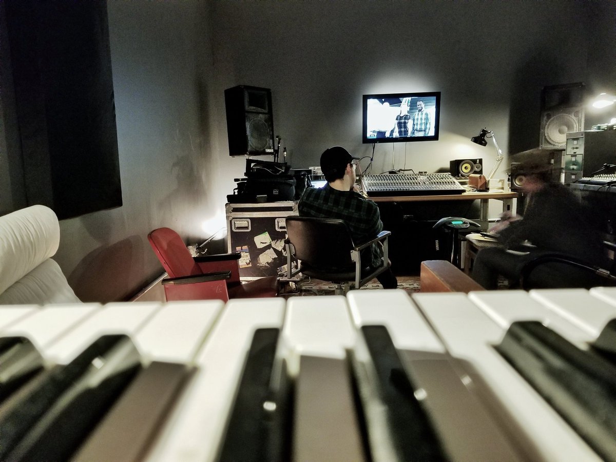 Commercial and short film, music and audio mix review in the control room.