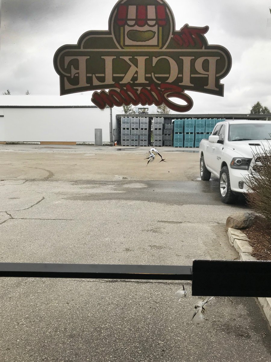 Picklestation's tweet photo. When you get to work on Monday morning only to notice bullet holes in our main office door!! When investigating into it we find out it happened on  #FridayThe13th ! #vandalism #ckont #RuralCrime @TVF_Farms https://t.co/kJa0wHRuxW