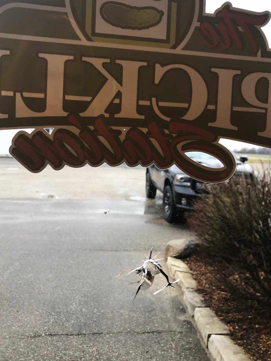 Picklestation's tweet photo. When you get to work on Monday morning only to notice bullet holes in our main office door!! When investigating into it we find out it happened on  #FridayThe13th ! #vandalism #ckont #RuralCrime @TVF_Farms https://t.co/kJa0wHRuxW
