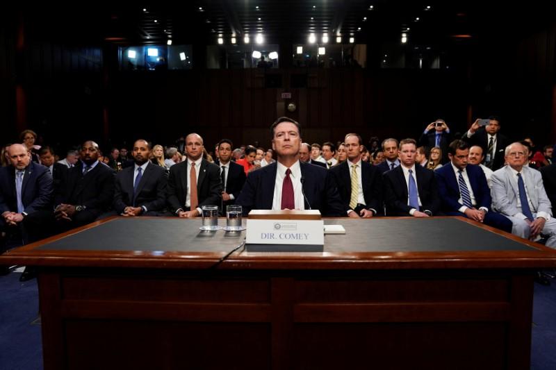 Reuters's tweet photo. Trump, Republicans intensify attack on ex-FBI director Comey https://t.co/6EqES3yhq9 https://t.co/9SBUcgPdOz