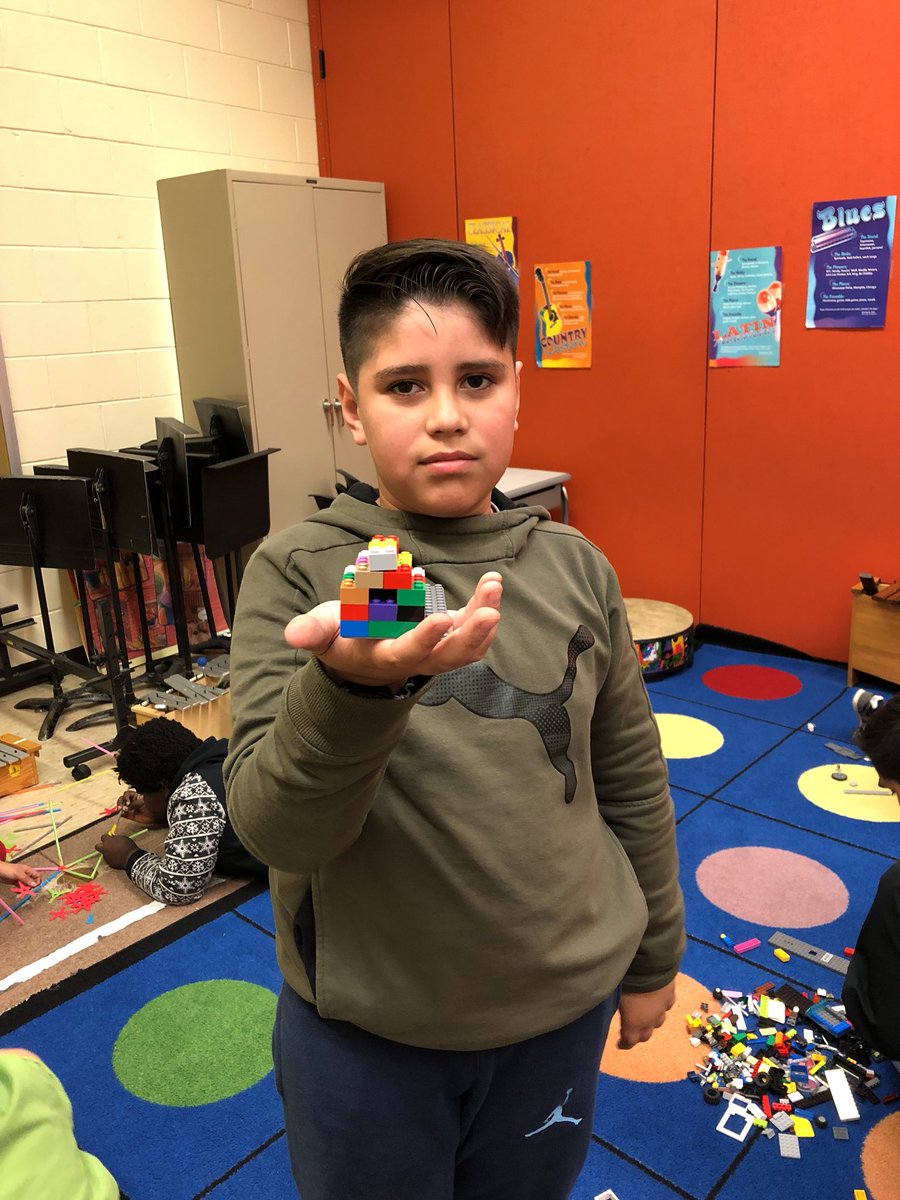 MrsKosmicki's tweet photo. A house with a triangular roof @LEGO_Education @GIPSFoundation @JeffersonGIPS #whyigive #gipsmakerspace https://t.co/cy22NeHpYA