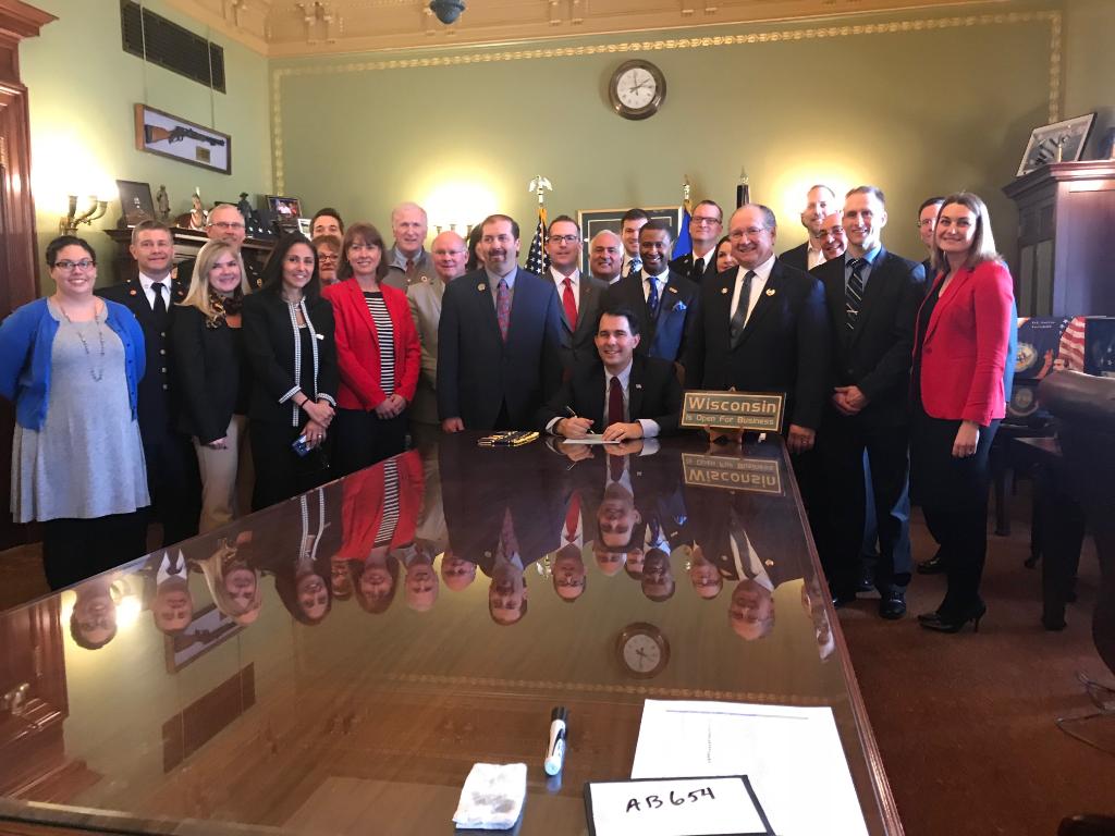 AHAWisconsin's tweet photo. We are so happy to share that Dispatcher Assisted CPR for the whole state of Wisconsin was signed into law today! This law will ensure all dispatchers are able to give CPR instructions over the phone, turning any untrained caller into a lifesaver. #CPRWisconsin https://t.co/QVGR3UdKb7