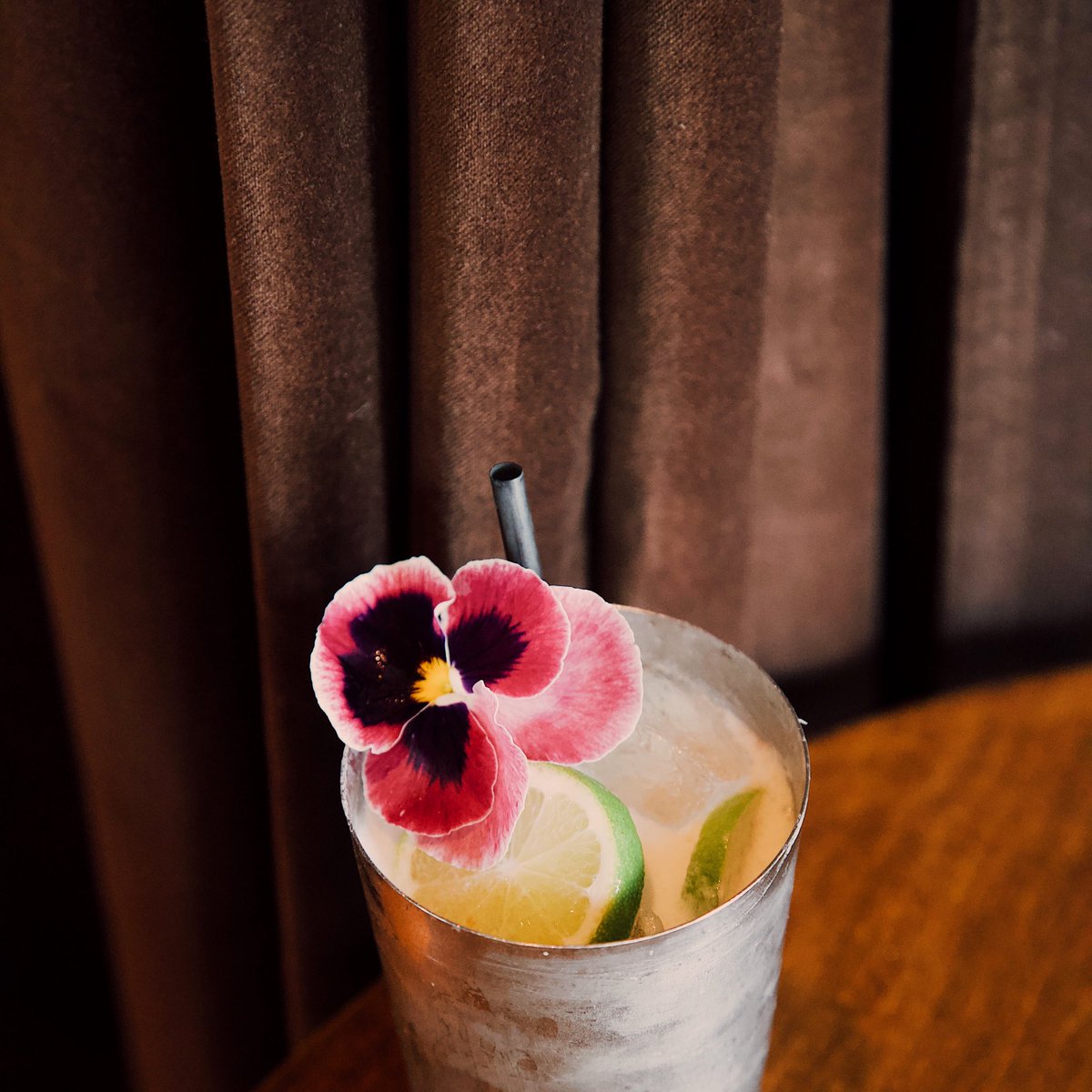 The Diplomat: Jalapeño infused Diplomatico Rum with coconut syrup, honey syrup and lime juice! 🎈