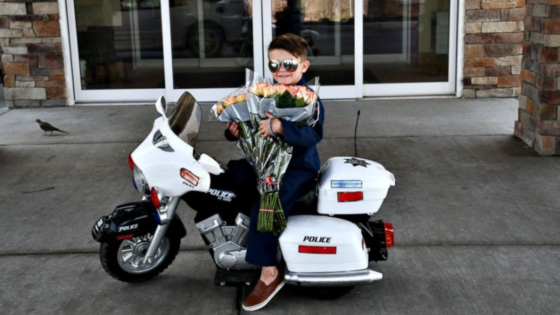 GMA's tweet photo. 6-year-old 'officer' gives roses to nursing home residents, tickets for 'being too cute' and we just can't get enough ❤️ https://t.co/98jpmQGQfh https://t.co/B58RPIBtcV