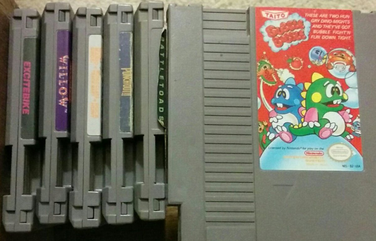 MetalMMadness's tweet photo. Guys!  Look what I found deep in my parents storage from when I was younger! (Excitebike, Willow, Mario Tri Cartridge ((Mario, Duck hunt, Track Meet)), Punchout!, Battletoads, Bubblebobble) https://t.co/BtW8Hnn8pf