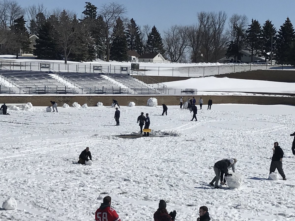 GoAugie's tweet photo. .@AugieFB out clearing the April snow from KO in order to get practice in this week | #WeAreAU | #EarnIt https://t.co/wDK6LWdoiV