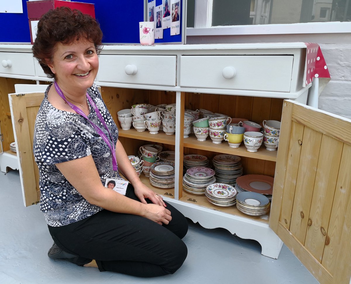 GrangeCentreCEO's tweet photo. I couldn't resist a photo of our talented catering supremo Maria, putting away some beautiful vintage crockery that had kindly been donated to use at our Tuesday @SconesSimply afternoons. If you haven't tried scones in our sunny conservatory, book yourself in for a spring treat. https://t.co/G5c7bM4SO9