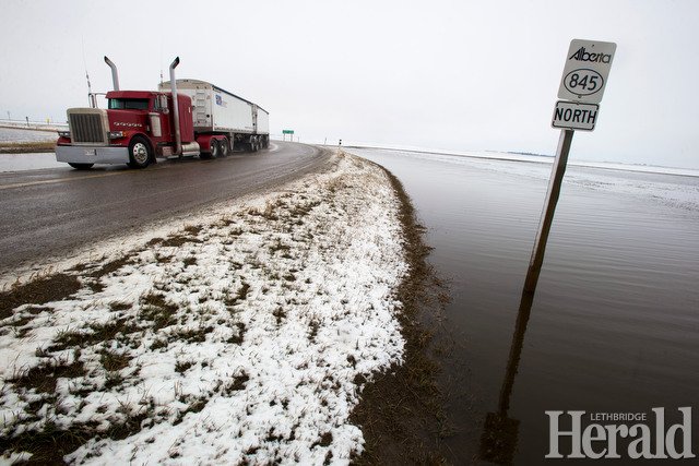 IMartensHerald's tweet photo. Meltwater rising earlier today at Wilson Siding along Hwy4 south of #yql , one of the areas of low drainage as @LethCounty has declared a state of local emergency due to flooding #lethcounty https://t.co/25QEwswnLn