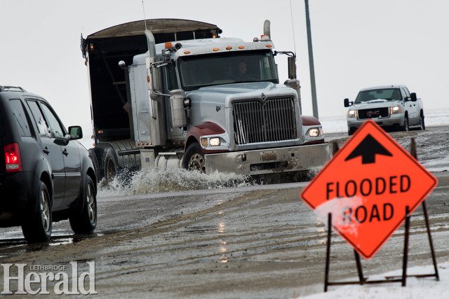 IMartensHerald's tweet photo. Meltwater rising earlier today at Wilson Siding along Hwy4 south of #yql , one of the areas of low drainage as @LethCounty has declared a state of local emergency due to flooding #lethcounty https://t.co/25QEwswnLn