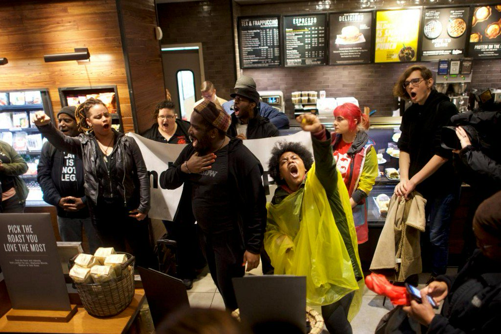 Reuters's tweet photo. Starbucks CEO says arrests of two black men 'reprehensible' https://t.co/B9c90sPuB9 https://t.co/XhoIxN0ftK