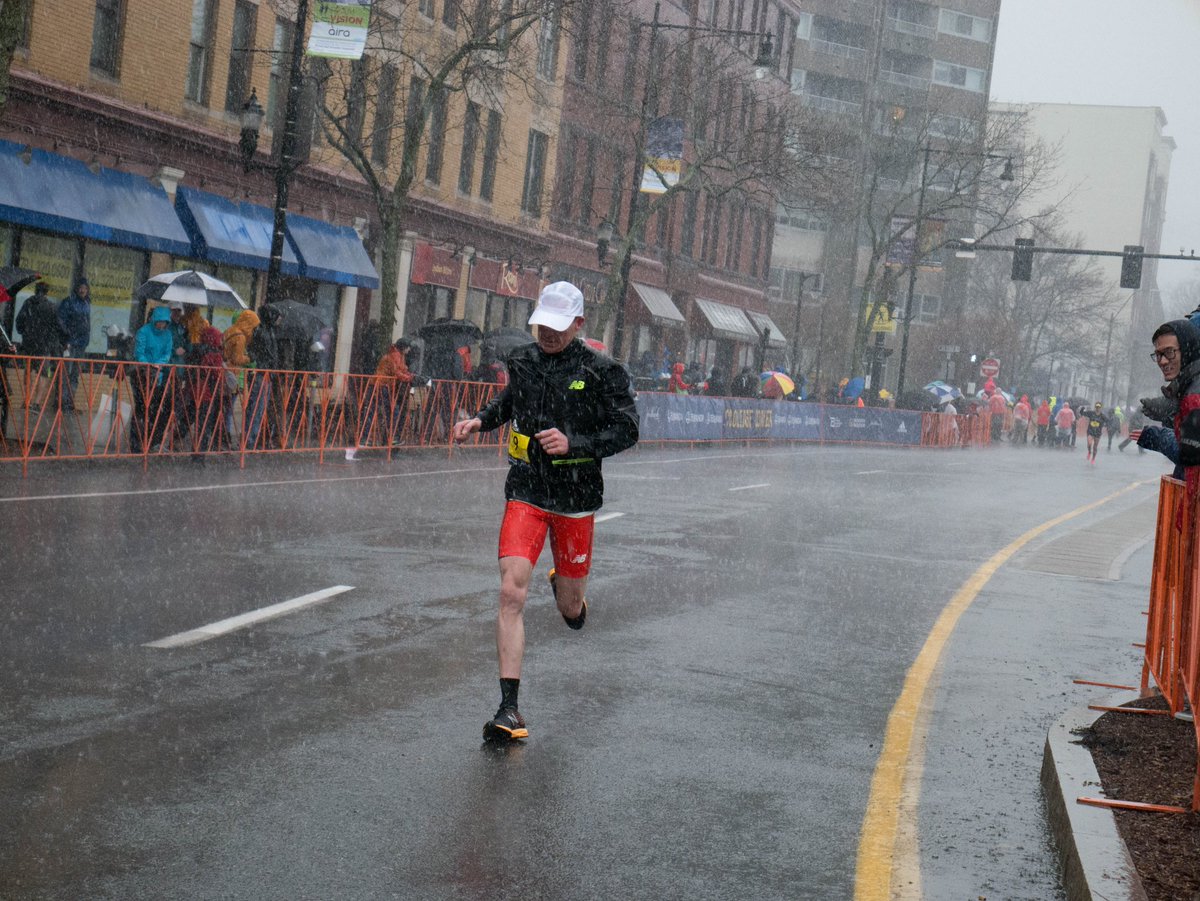 charlesborsos's tweet photo. Eventually I'll organize all the pictures I took at the #bostonmarathon Here, 9th place finished Reid Coolsaet (CAN), battles the wind and rain that still hasn't let up hours after finish. https://t.co/dNxrcyXxId