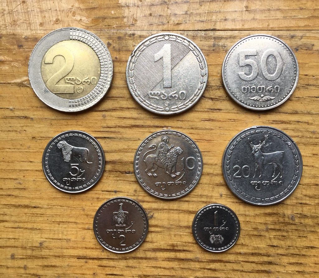 1 лари к рублю. Монеты лари тетри. Тетри валюта Грузии. Ларри грузинские деньги. Грузинская валюта лари.