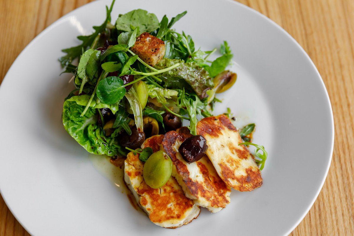 HighStSoc's tweet photo. Two of our dishes on this Friday evenings menu: Grilled halloumi, grape and olive salad, pomegranate and lemon vinaigrette and Breconshire Parmesan pork schnitzel, fresh lemon, wild garlic pesto with roast tomatoes. https://t.co/yWTubrDdG4