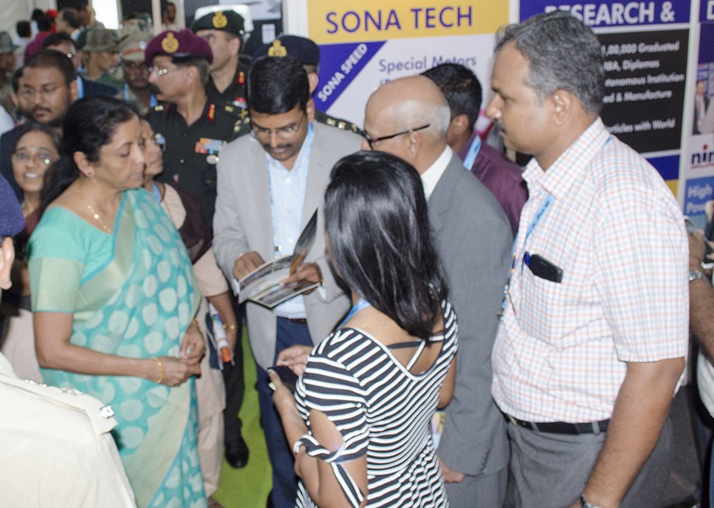 sonacollege's tweet photo. Hon'ble Minister of Defence Nirmala Sitharaman visits Sona College of Technology booth at the #DefExpo 2018. #defexpo2018 #sonaversity #sonaspeed #animation #bldcmotor #analytics #sonatech #veetech @nsitharaman https://t.co/Xl0zGatkXu