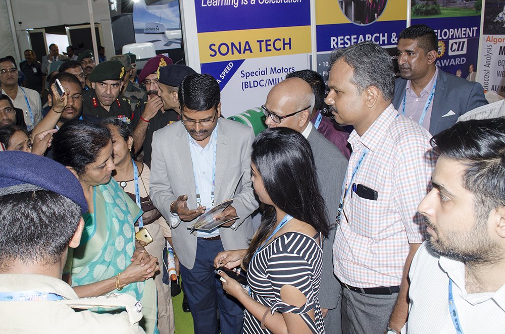 sonacollege's tweet photo. Hon'ble Minister of Defence Nirmala Sitharaman visits Sona College of Technology booth at the #DefExpo 2018. #defexpo2018 #sonaversity #sonaspeed #animation #bldcmotor #analytics #sonatech #veetech @nsitharaman https://t.co/Xl0zGatkXu