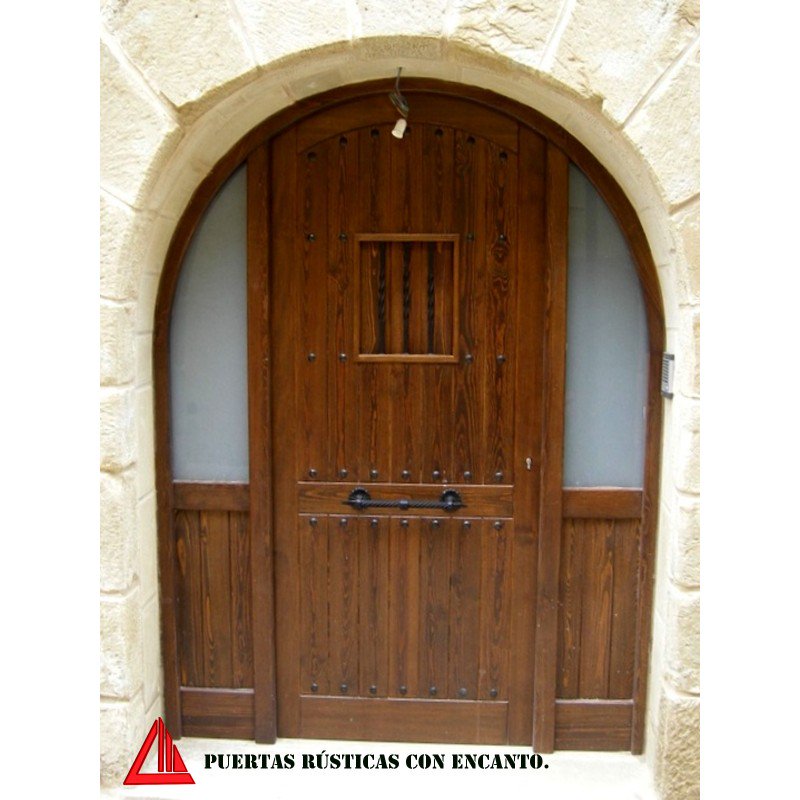 CarpinteriaMena's tweet photo. Puerta de exterior semicurva de pino barnizado en color nogal oscuro con tarima vertical partida, clavos de forja y ventano interior con reja de forja en marco de medio punto con fijos a ambos lados.
#carpinteriamena #carpinteriamedida #puertasrusticas
https://t.co/hny7RVZAYT https://t.co/dIl8BMnsIe