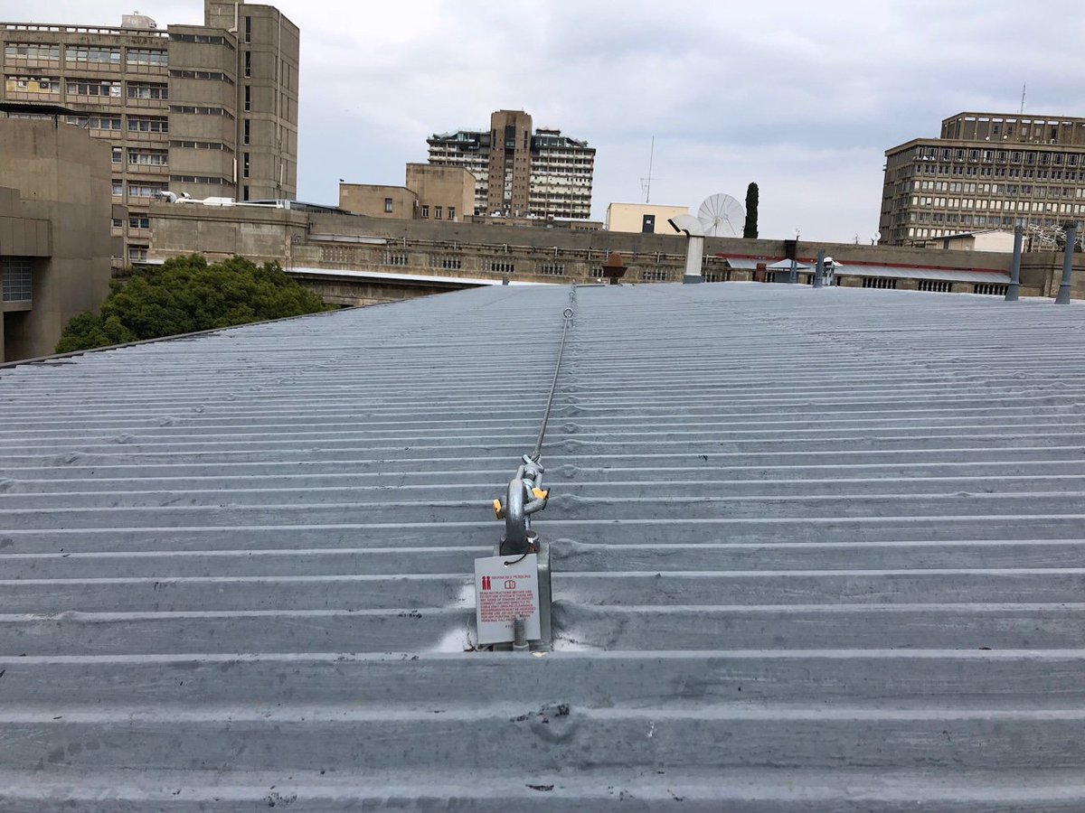 designanchor1's tweet image. The Johannesburg skyline framed this permanent roof safety cable installation at a South African University. #safety #designanchor