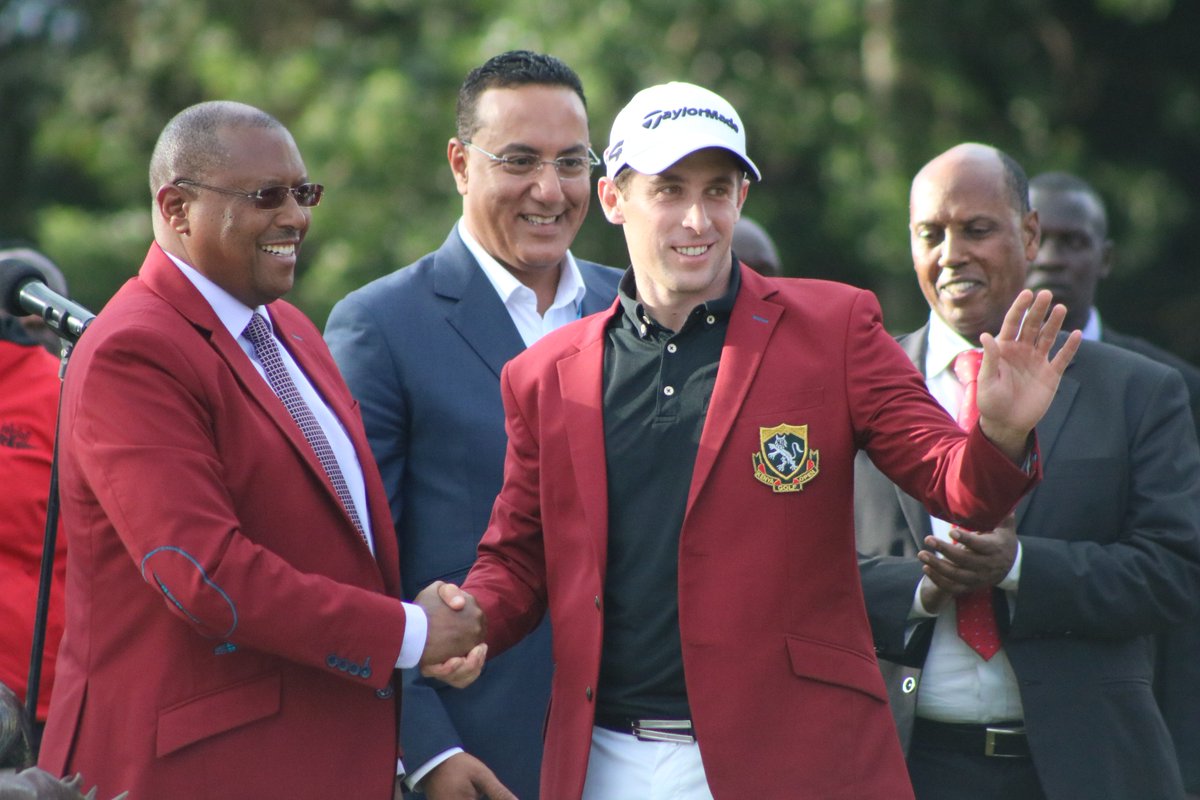 nairobinow's tweet photo. #Nairobi: The @KenyaOpenGolf, worn for the 1st time at the #KenyaOpenat50.

The first recipient of this jacket was @Lorenzo_Gagli, from Italy, the winner - awarded by @Barclays_Kenya Chair, Charles Muchene - in the pres. of the President - on Mar. 25, 2018 at #Muthaiga #Golf Club https://t.co/GosZmxUPhl