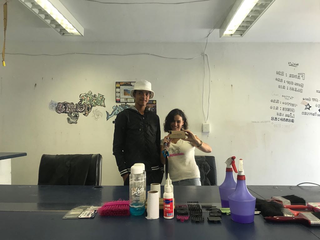 lalelaproject's tweet photo. Lalela Alumni Faisal started cutting hair in homes & bc of the creativity of his cuts, became very popular. He saved up to open this shop & plans to use the $ to study engineering! #ArtsEd Support students like Faisal, join our #ClassCampaign at https://t.co/kR1iRPa8j6! https://t.co/jsn93cxxHd