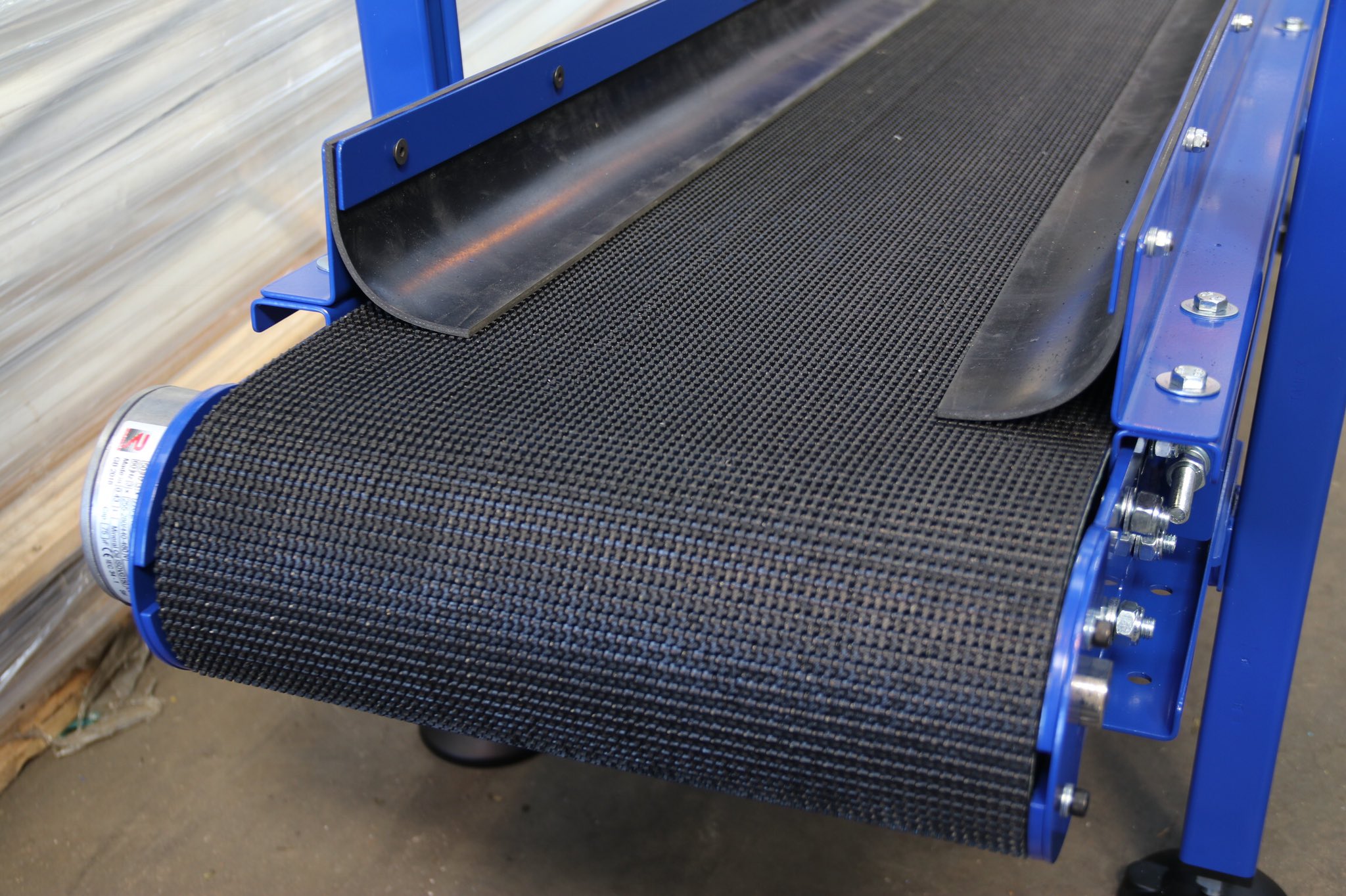 KBR Conveyor Sections on X Fitting rubber skirting to a small inclinebeltconveyor conveyor to be used for small parts dropping from a machine chute ukmfg mfg EngineeringUK ManufacturingUK Manufacturin...
