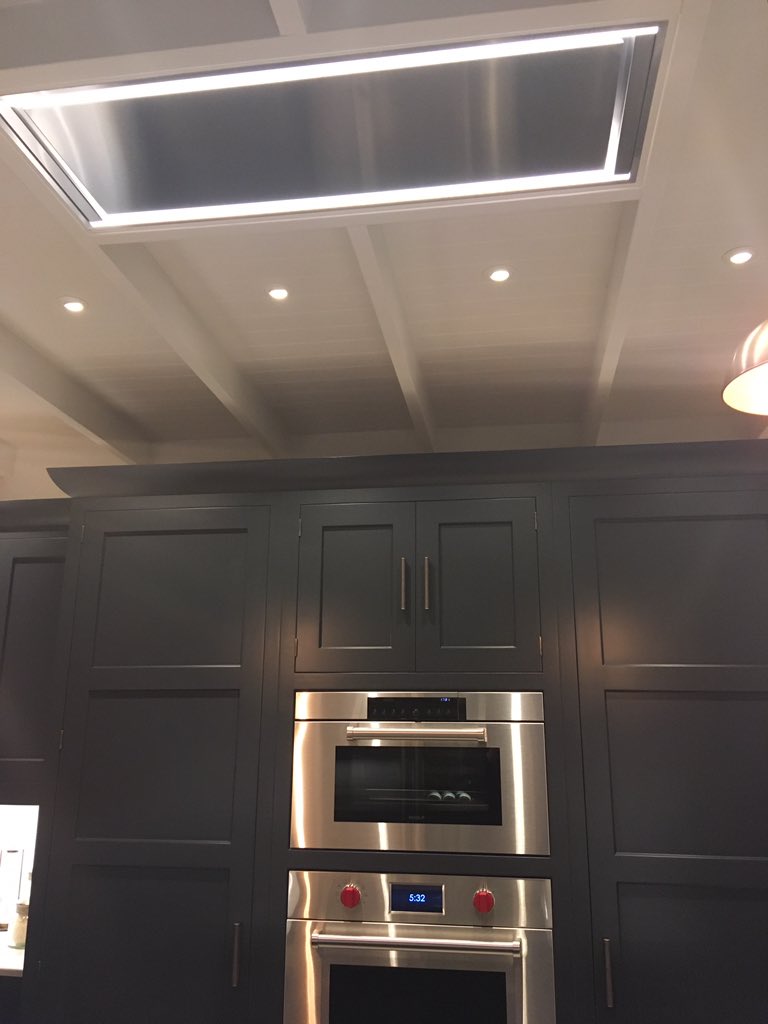 westinhoods's tweet photo. We're big fans of dark kitchens...... and this one at the newly opened #TomHowley #Cambridge showroom is no exception. @SubZeroWolfUK appliances matched with our sleek Stratus Blade ceiling hood 👌🏼#cookerhood #kitchenappliances #kitchendesign #luxurykitchens #kitchen #kitchens https://t.co/LtevvOUxmC