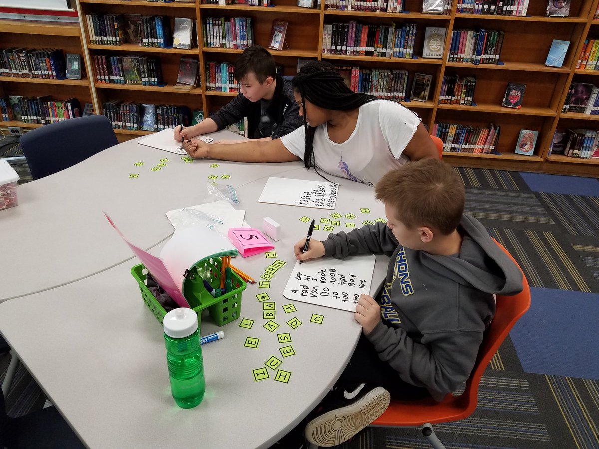 arbutuslibrary's tweet photo. Ms. Fultz and her iReady class are collaborating through a series of learning stations in the library today.  New vocabulary words are being used in creative writing stories written by each small group.  Authentic learning makes learning fun @ the AMS library! #bcpslms #slm18 https://t.co/3CrJGNLWzG