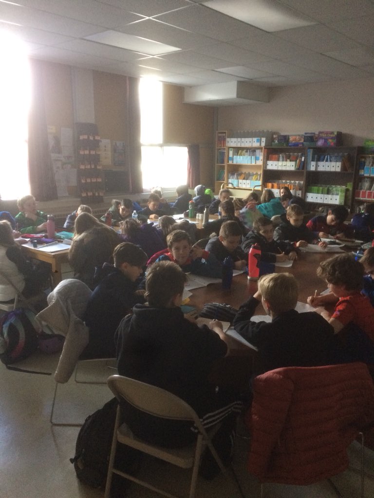 Ms__LAnderson's tweet image. What a treat! #class52 and #class53 get to work together today.... in the STAFFROOM! So proud at how flexible these kids are as we wait for the power to come back. @JTTschool @BurlingtonHydro