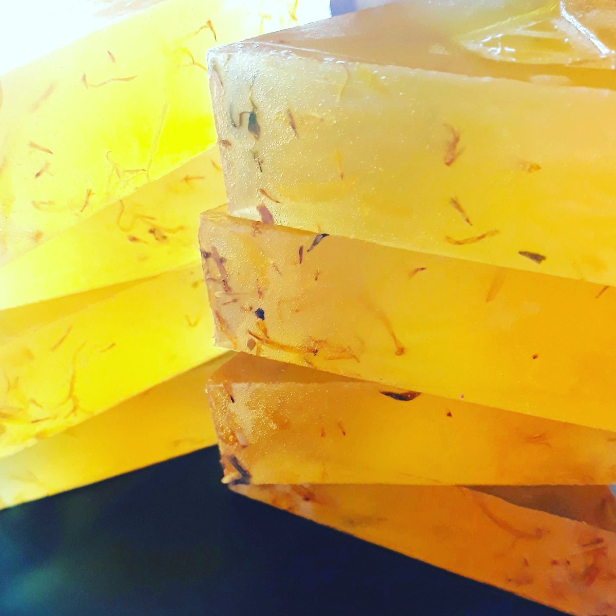 lincs_lassie's tweet photo. Fresh batch of Spanish Amber #soap ready to be wrapped. A blend of amber, patchouli, musk and vanilla with suspended dried calendula petals. My favourite bar to make when it's #sunny. #soapmaking #ambersoap #slsfreesoap https://t.co/H90bwGTsaC
