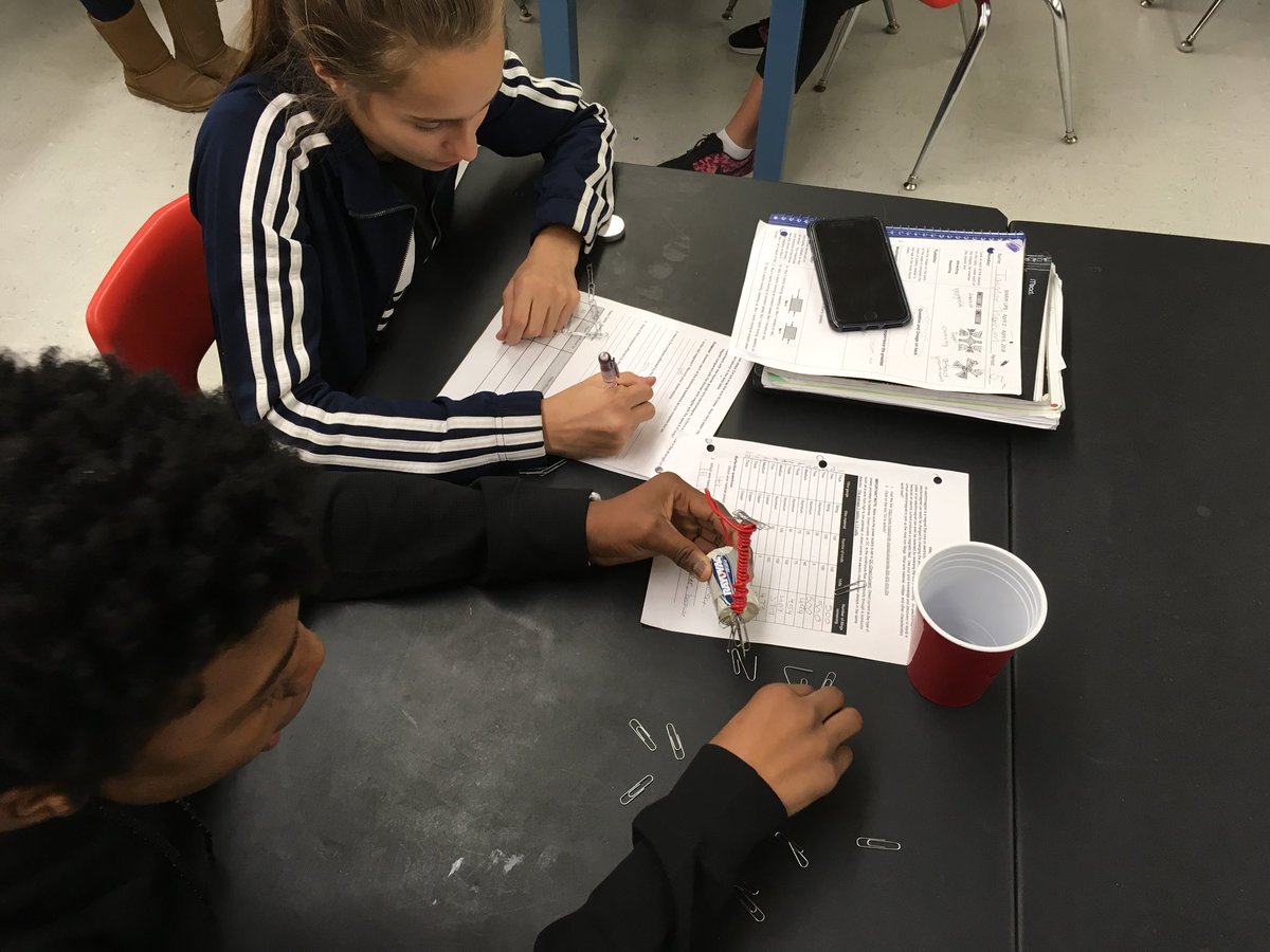 GahannaMSWest's tweet photo. Making electromagnets with batteries, wire, nails and paper clips. I wonder what the record will be? #GJPSscience #westisbest @SharonSuriano https://t.co/K95iB9qyHk