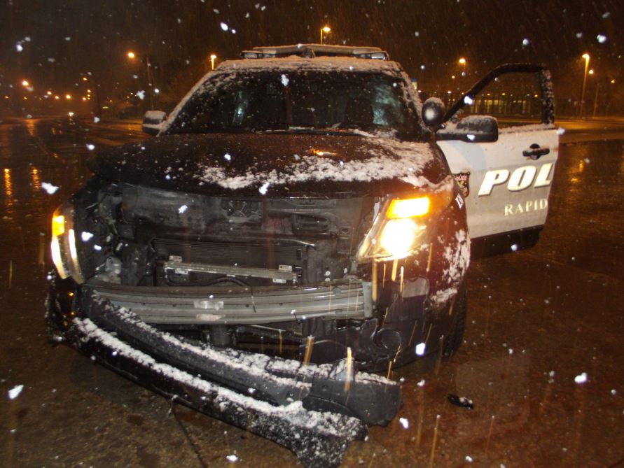 RapidCityPD's tweet photo. We're thankful to report that no one was significantly hurt in a collision between one of our patrol cars and a vehicle that ran a red light early this morning. For everyone's safety, please be an attentive driver!

#SafeRC #PayAttention https://t.co/sAOSx1olJQ