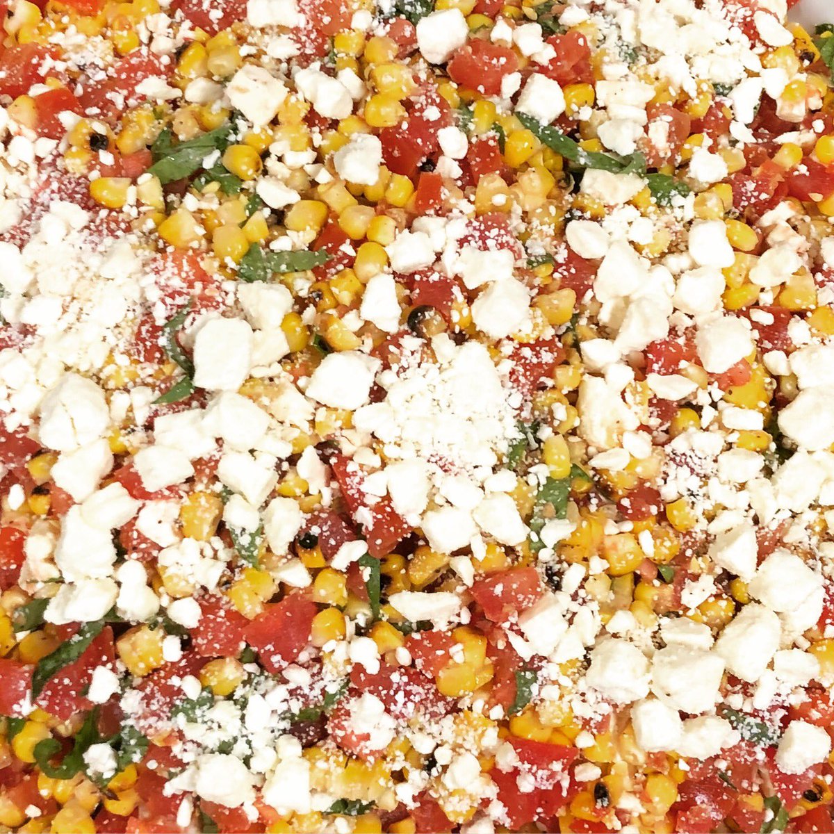 RLMProvisions's tweet photo. Tomato, roasted corn & feta salad from @Ali_Rosen’s #BringItBook @MelissasProduce #InMelissasKitchen https://t.co/unwVWIwKbO