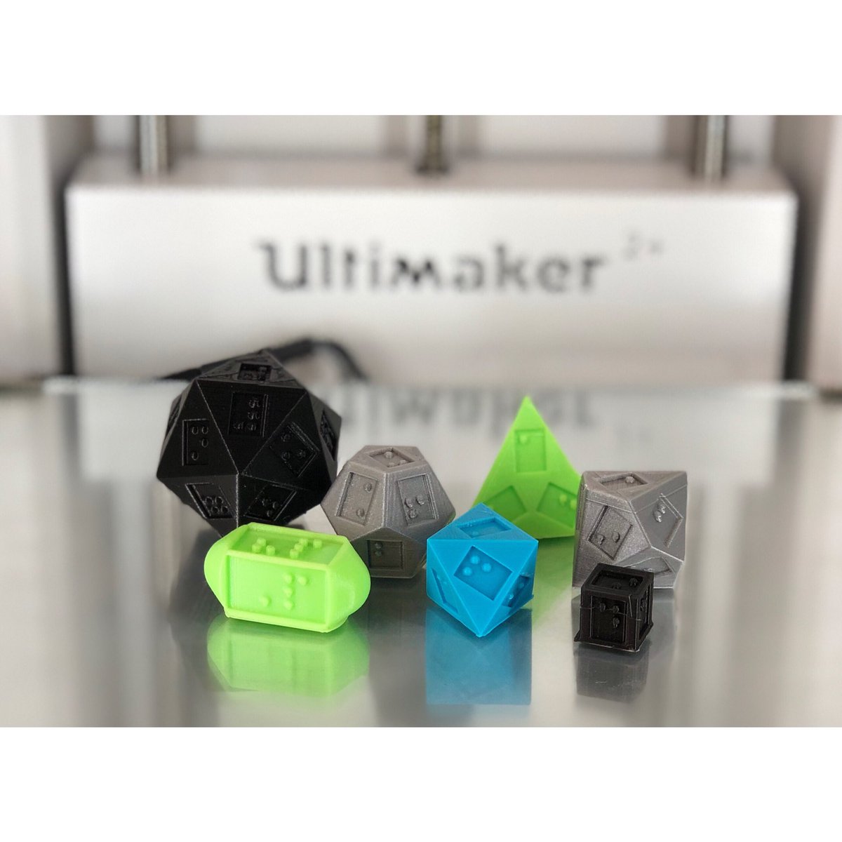 WestCaldwellPL's tweet photo. Isn’t it amazing what a 3D printer could do? This is a set of Braille dice. Patrons can request for a print of their own design! #wcpl #3dprinting #ultimaker2plus #librarylove #brailledice #braille https://t.co/teCSWk80V0