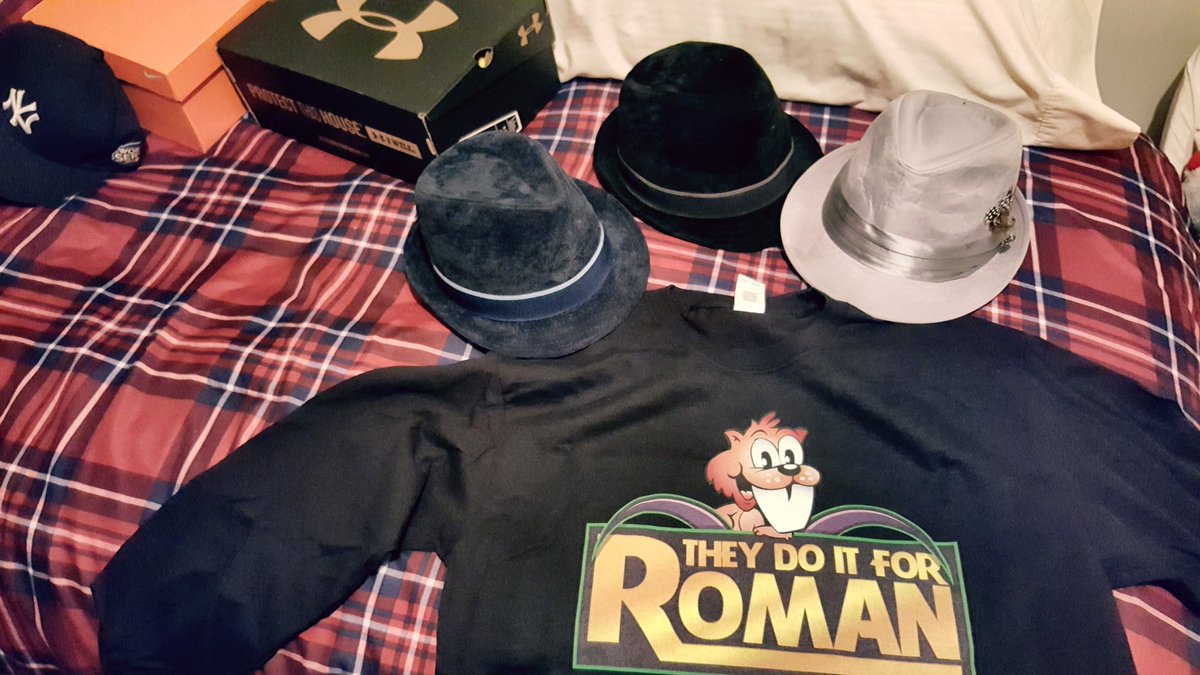 Michigan4Str8's tweet photo. Packing all my essentials for #WrestleManiaWeekend in #NewOrleans Suits, Shirts, Fedoras, New sneakers, Yankee hat, and my brand new "THEY DO IT FOR ROMAN" shirt from #BarberShopWindow Gonna be an EPIC week. #Vacation #GumboTime #Wrestling #WrestleMania34 https://t.co/bhODOjRT3I