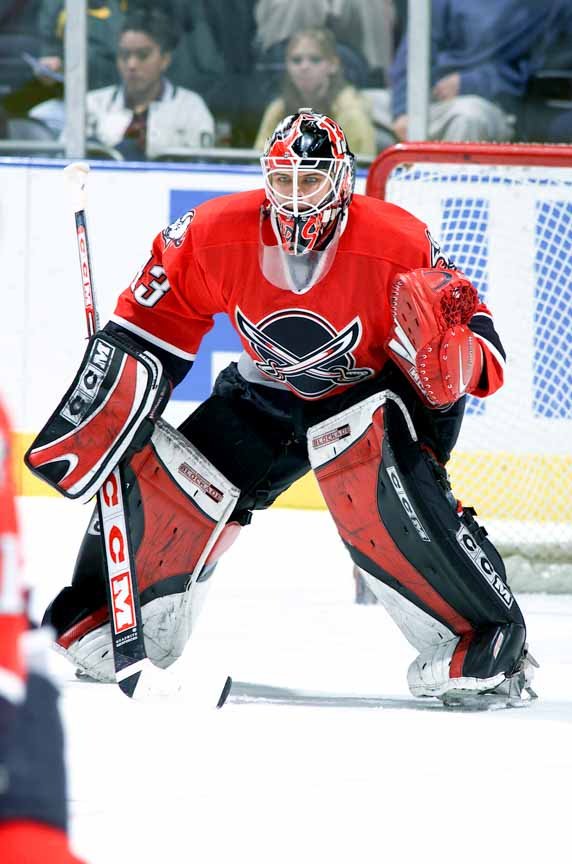 Buffalo Sabres goalie Martin Biron stretches to make the glove