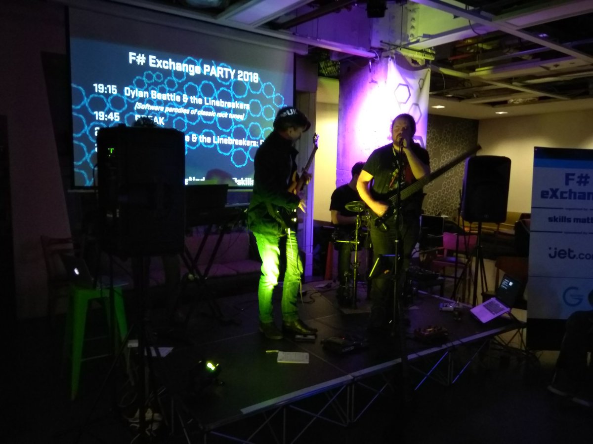 MikhailShilkov's tweet image. Now @dsyme is playing guitar on another stage #fsharpX