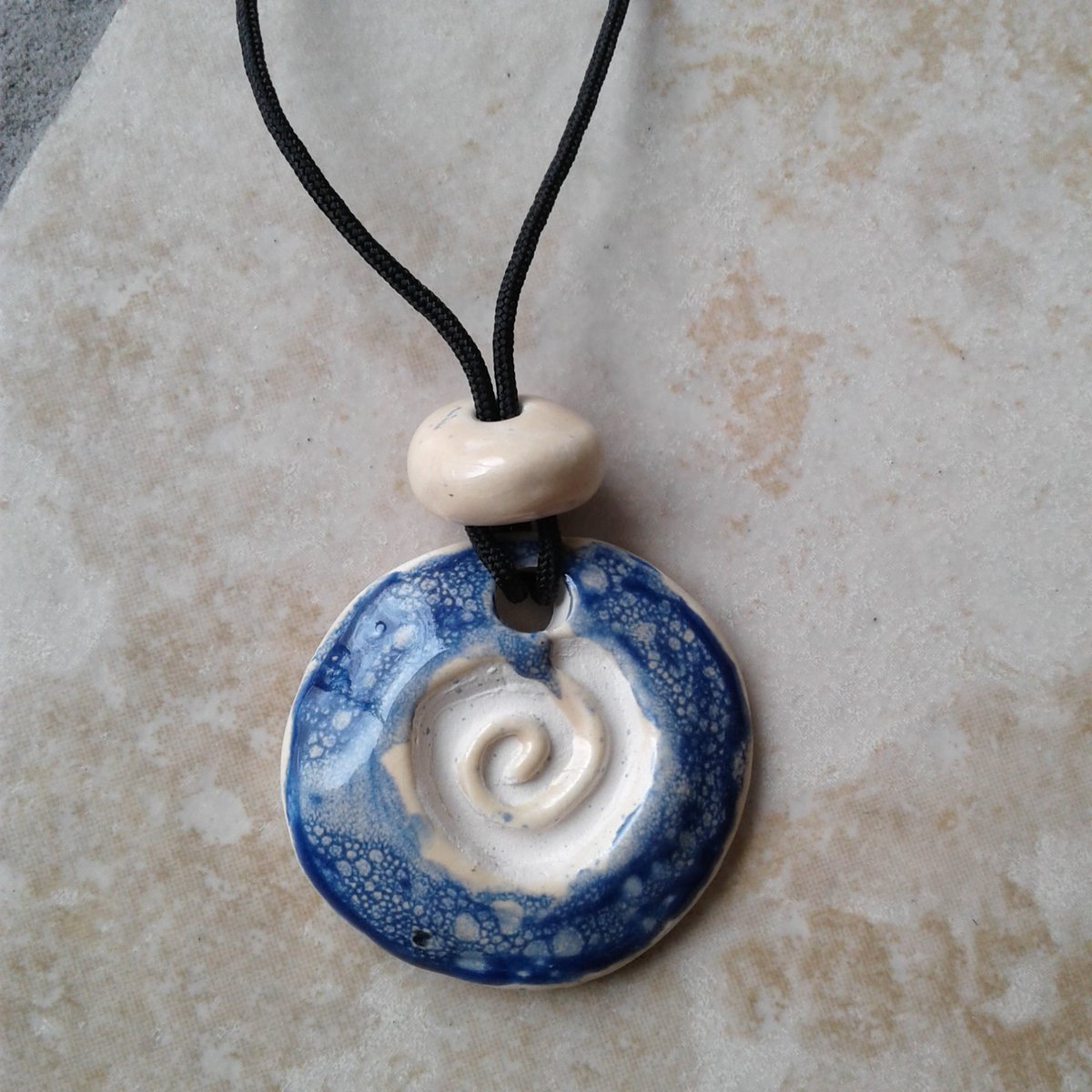 dragonchimes's tweet photo. Celtic Spiral Clay Aromatherapy Necklace Cobalt Blue Cream Essential Oil Diffuser Disc Pendant Ceramic Pottery Bead Pagan Symbol https://t.co/eyC1QDknGx #love #ClayDiffuser https://t.co/7pYQc52wYs