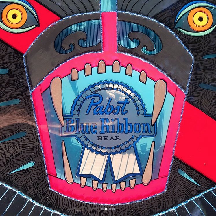PabstBlueRibbon's tweet photo. Check out this party animal by @sallykeyster titled "Blue Ribbon Bear." It's three layers of embroidered and painted glass.  In person the bear is literally popping out at you. It's her take on a mounted trophy head, animal friendly taxidermy! 🍺🐻#PBRart https://t.co/ohJhpXJOL3