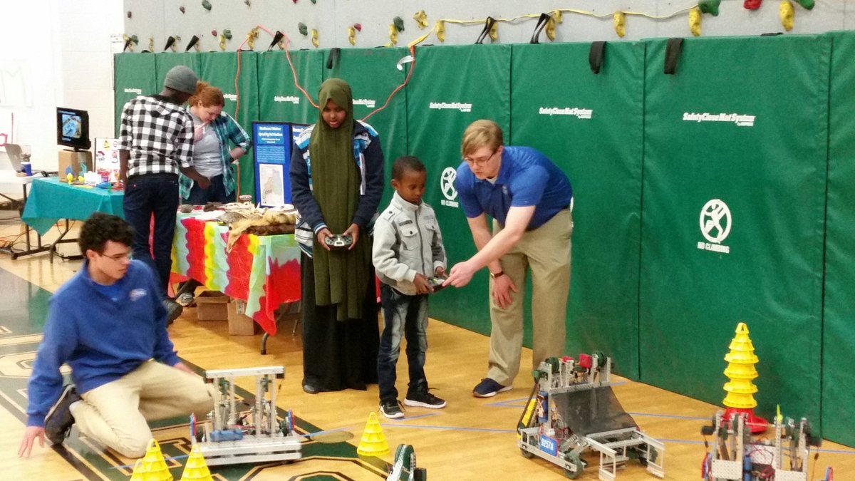 <a href="/CovCathColonels/">Cov Cath Colonels</a> senior Jordan Erpenbeck working with a family at RA Jones STEAM Carnival. <a href="/CovCathSTEM/">CovCathStem</a> <a href="/CovCathRobotics/">Cov Cath Robotics</a>