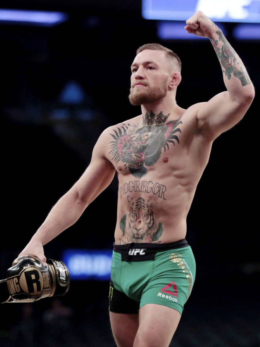 NBCNews's tweet photo. Champion UFC fighter Conor McGregor is in custody and is at the NYPD's 78th precinct where he is expected to be charged with assault following an incident in Brooklyn, New York, according to two senior New York City law enforcement officials. https://t.co/w1fpmZQ4oz