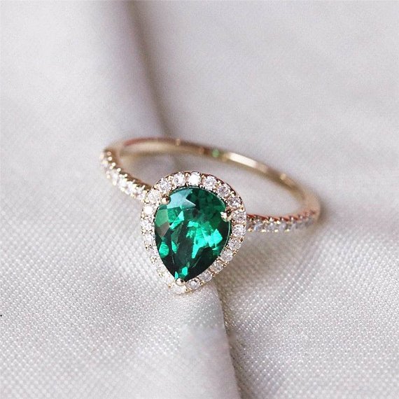 14k Yellow Gold Chatham Pear Cut Emerald Diamond Engagement Ring unusualengagementringsreview.com #emerald #green #natural #pear #shape #diamond #engagementring #engagement #ring #weddingring #wedding #yellowgold #yellow #gold #therock #black #white #asian #latina #hispanic #indian #women