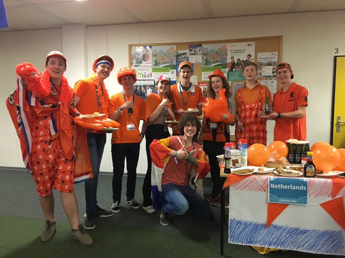The Mendelcollege EYP (European Youth Parliament)team is debating in Flensburg Germany.This evening we dined in the "European Village" where delegates brought foods from throughout Europe.Our lads had the full Koningsdag outfits! #oranjeboven #eyp #flensburg #debating #koningsdag
