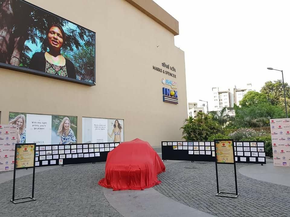 VRSurat's tweet photo. VR Surat's first ever Art Car was unveiled as part of the Art Car Project at #DAP2018. Catch a glimpse of this exciting, artistic evening and don't miss out on an artsy Volkswagen Polo on display at Magdalla Plaza, till 6th May. Only at #VRSurat. #DumasArtProject2018 #Art https://t.co/sADTJIbg18